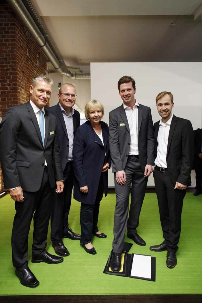 Hendrik Sämisch und Jochen Schwill auf der KlimaExpo NRW mit Hannelore Kraft.